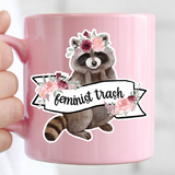 funny feminist trash raccoon sticker by get decaled. mug sticker, car sticker, laptop sticker, bumper sticker, glass sticker, raccoon sticker, feminist sticker, feminist art, cute raccoon sticker, best decals, decal shop usa, decal shop