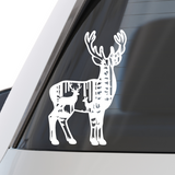 White deer decal on a car window