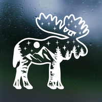 White moose decal with mountain and star design on a dark surface