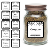 Glass jar of oregano with customizable spice labels on a white background