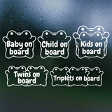 Set of 'on board' signs with different text on a dark background