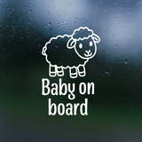 White sheep illustration with 'Baby on board' text on a dark, rain-dotted window background