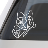 White floral decal on a car window