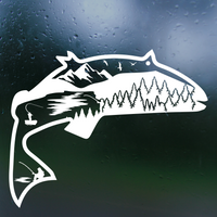 White fish-shaped decal with nature elements on a dark surface